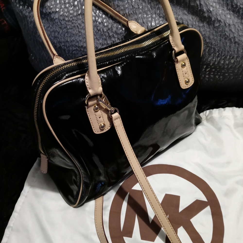 Two michael Kors purses